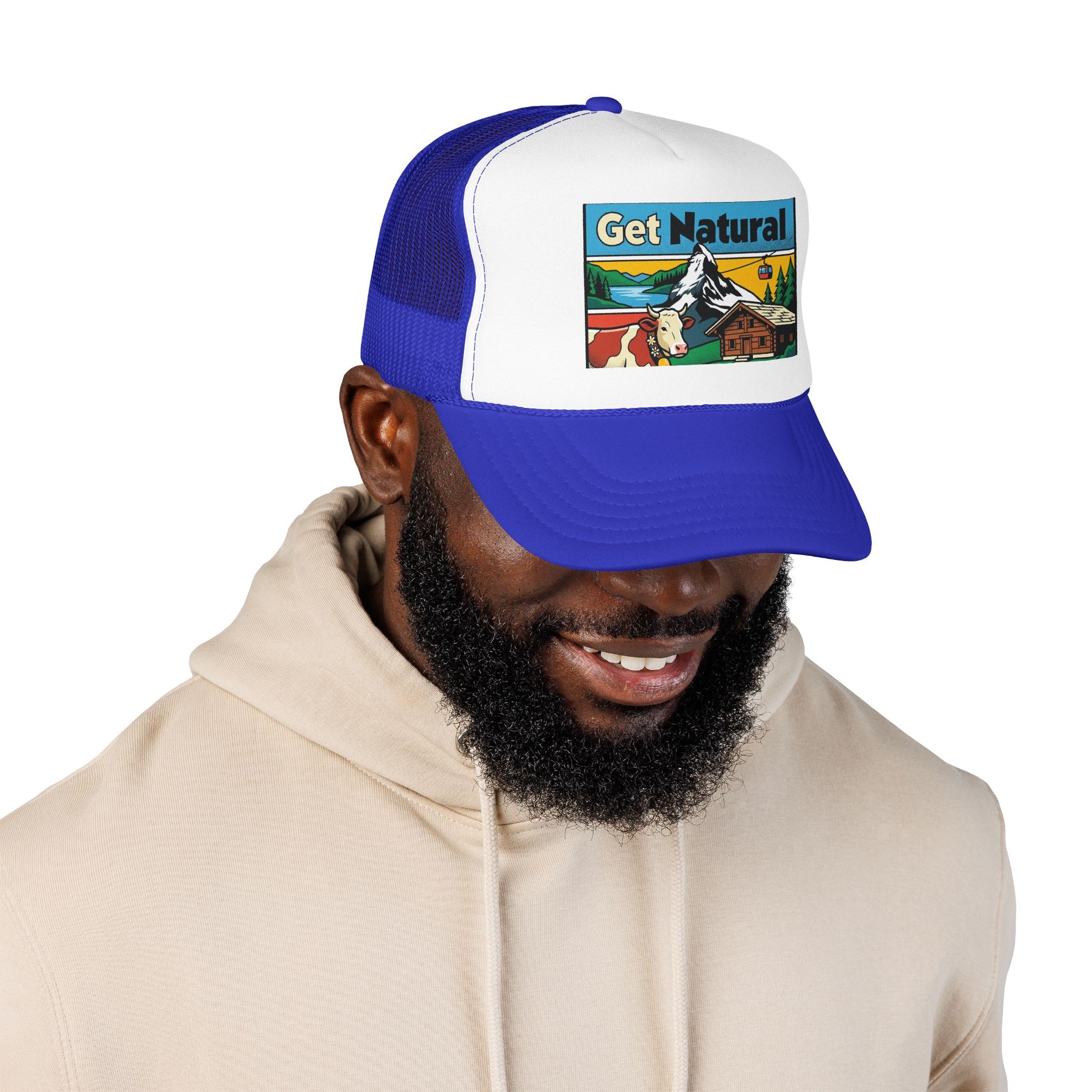 Royal blue and white trucker hat with front logo patch, curved brim and mesh back