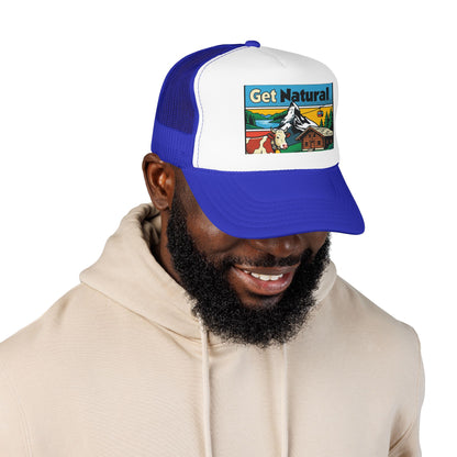 Royal blue and white trucker hat with front logo patch, curved brim and mesh back