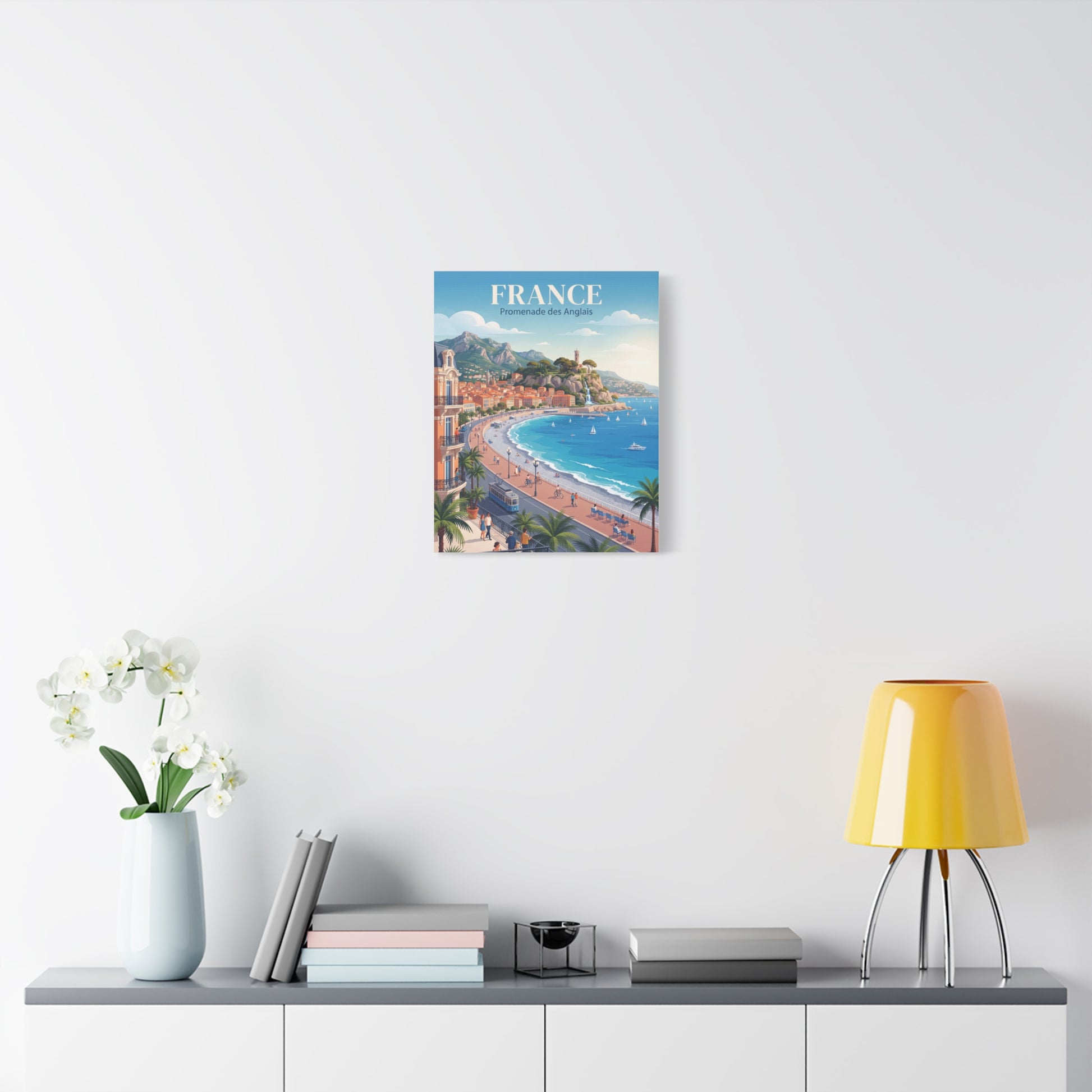 Matte canvas wall art featuring a France coastline with beach, palm trees, and blue water.