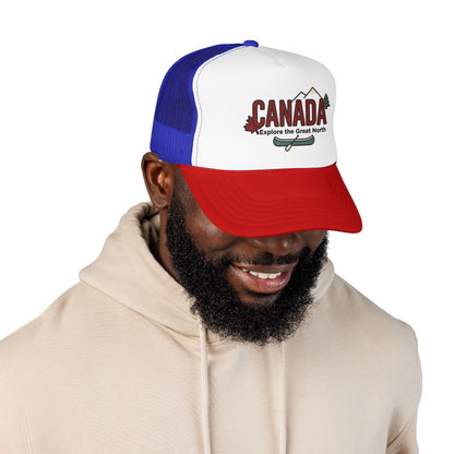 Blue and white foam trucker hat with Canada logo patch and red curved visor.