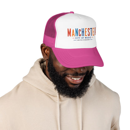 Manchester City trucker hat on model, white crown, magenta mesh panels, curved brim