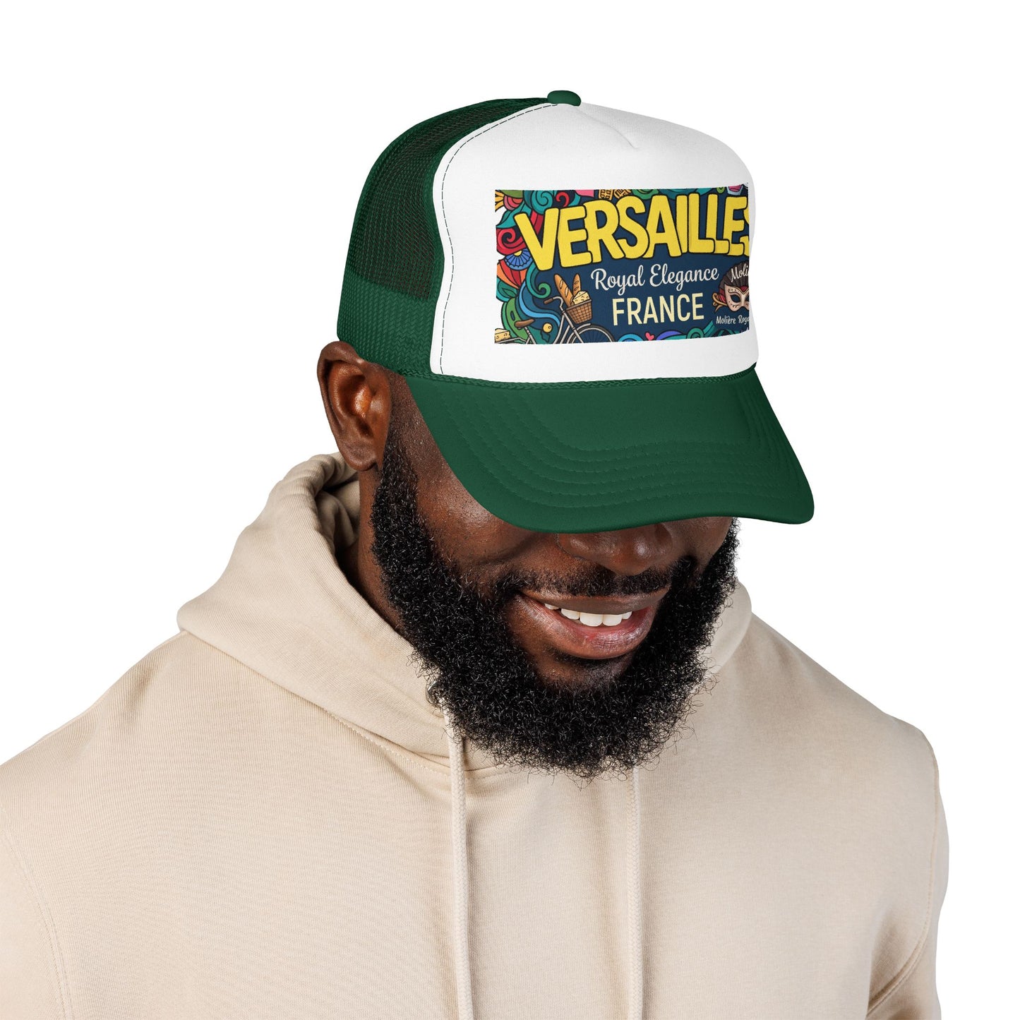 Green and white trucker cap with mesh panels and “Versailles France” graphic patch
