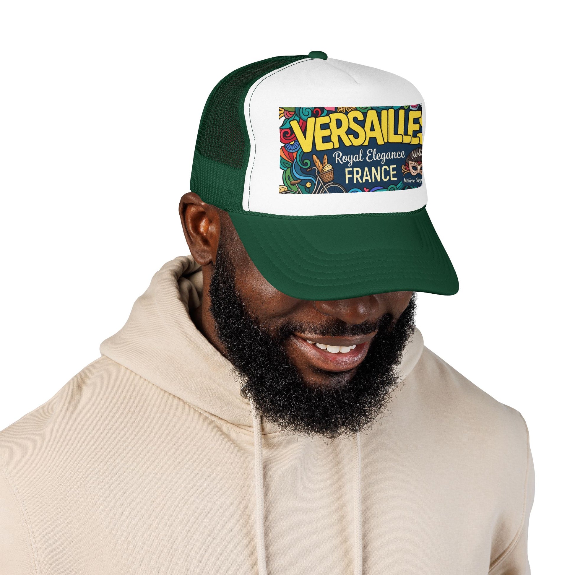 Green and white trucker cap with mesh panels and “Versailles France” graphic patch