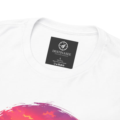 White crewneck t-shirt close-up with Destinasee label and coastal sunset graphic