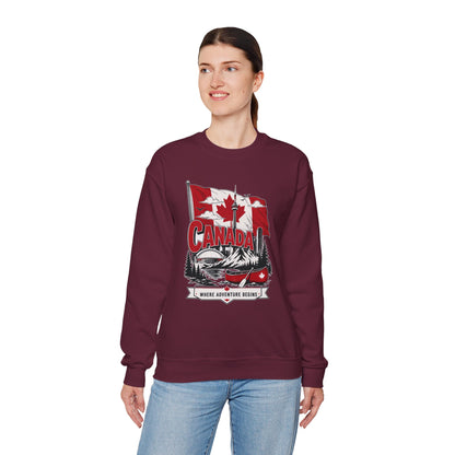 Maroon crewneck sweatshirt featuring Canada flag and canoe graphic on the front.