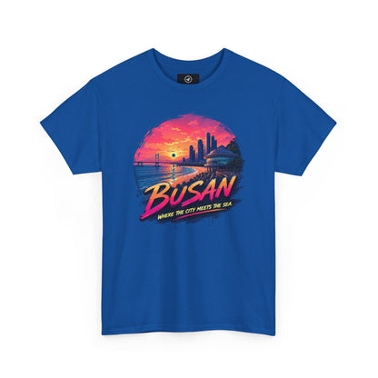 Royal blue crew-neck T-shirt with a “Busan” seaside sunset graphic circle on front.