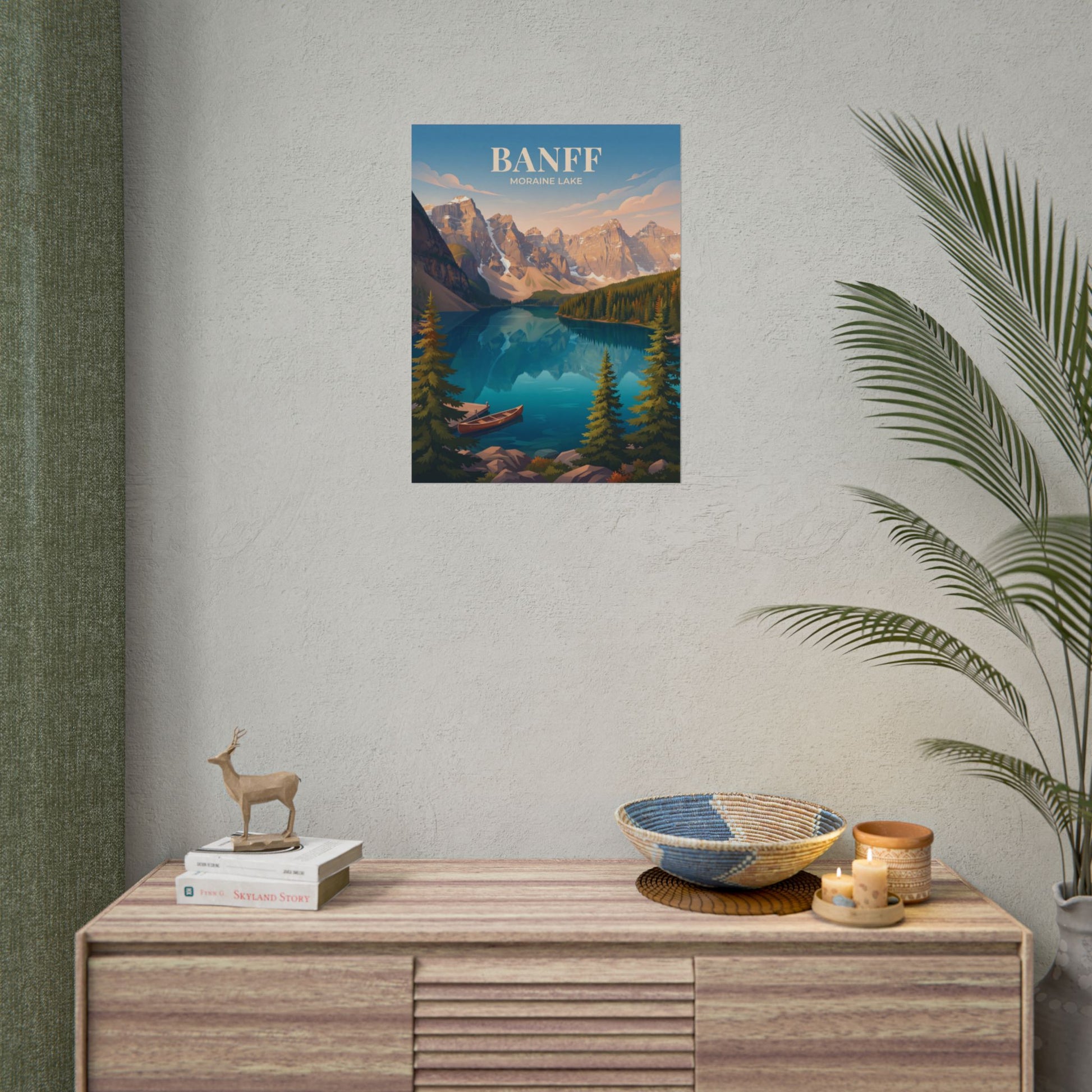 Banff Moraine Lake mini poster on wall above console with woven bowl, candles, and palm leaves