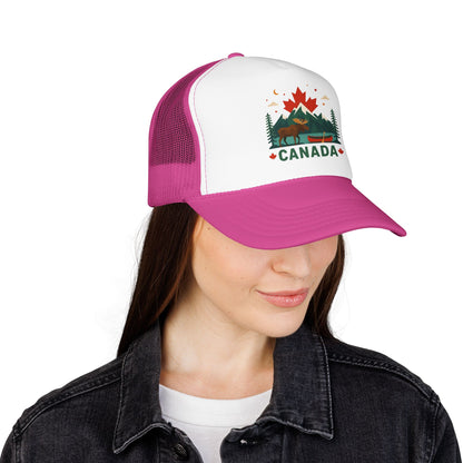 Pink and white trucker hat with mesh back and embroidered Canada logo on wearer's head