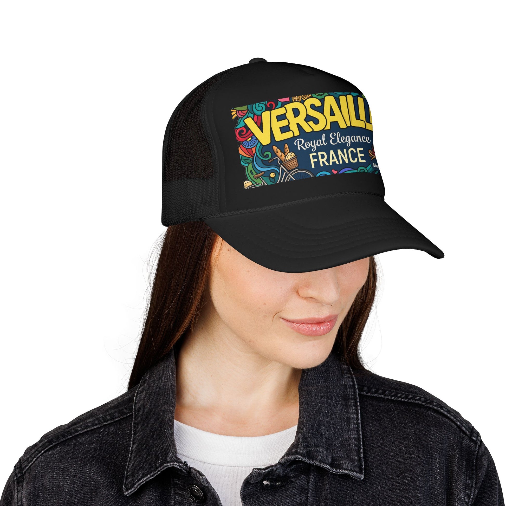 Black trucker hat with mesh back and colorful “Versailles France” front patch