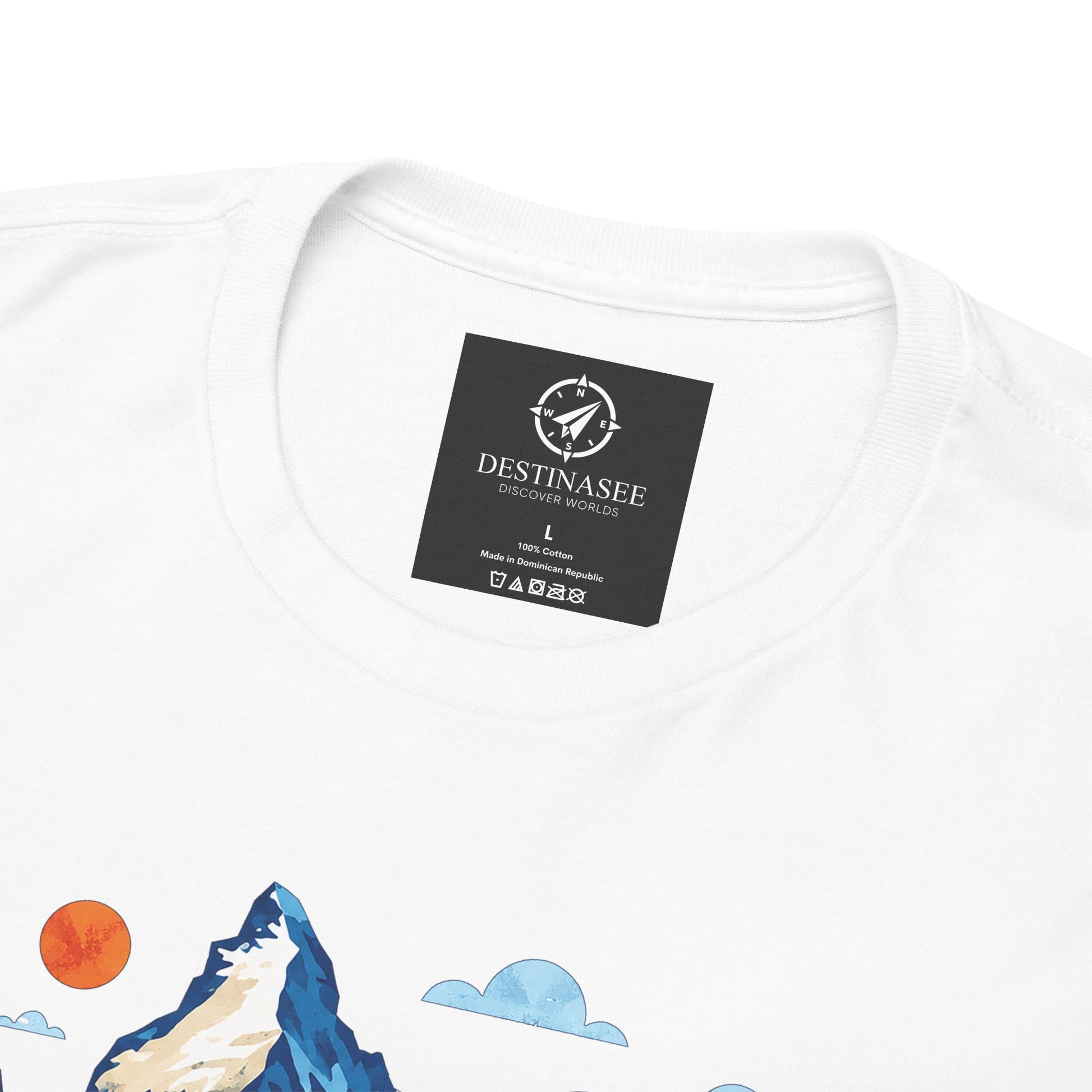 White T-shirt close-up: front graphic elements near collar and small chest label