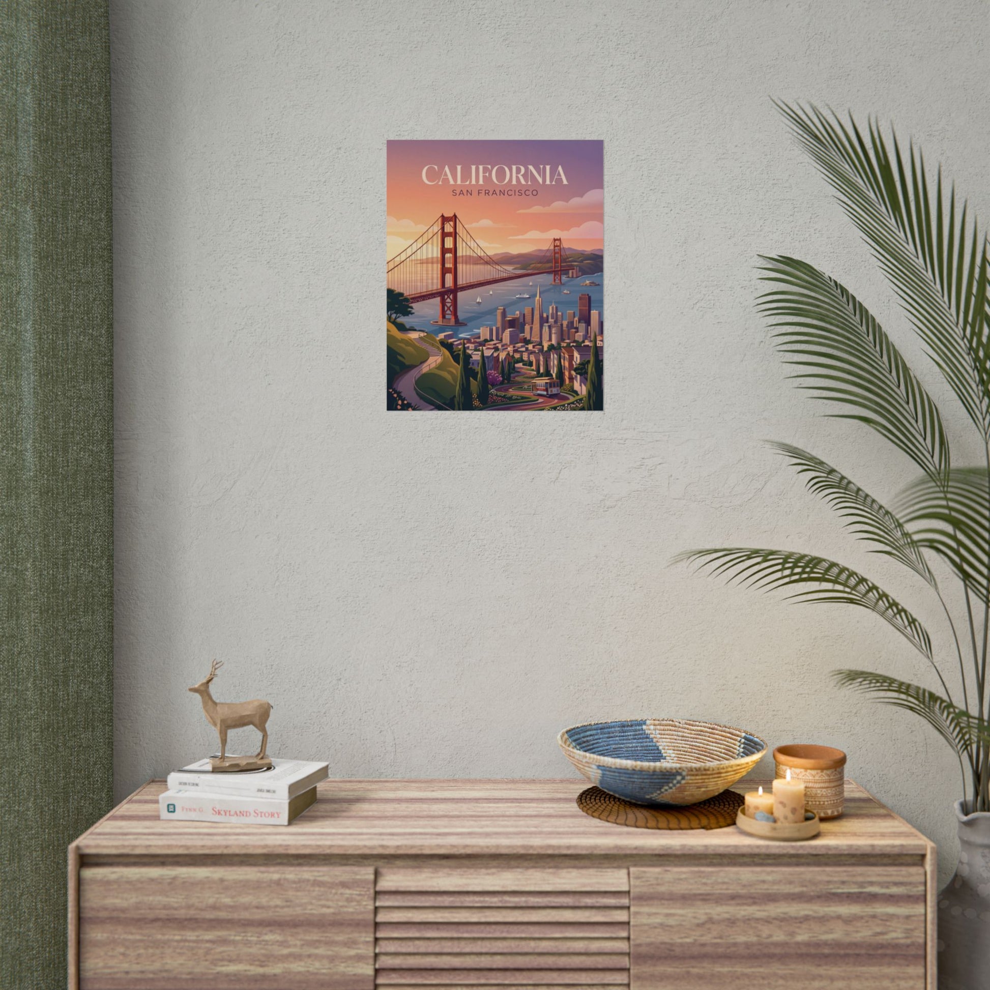 San Francisco California poster on wall above console with bowl, candle, and plants