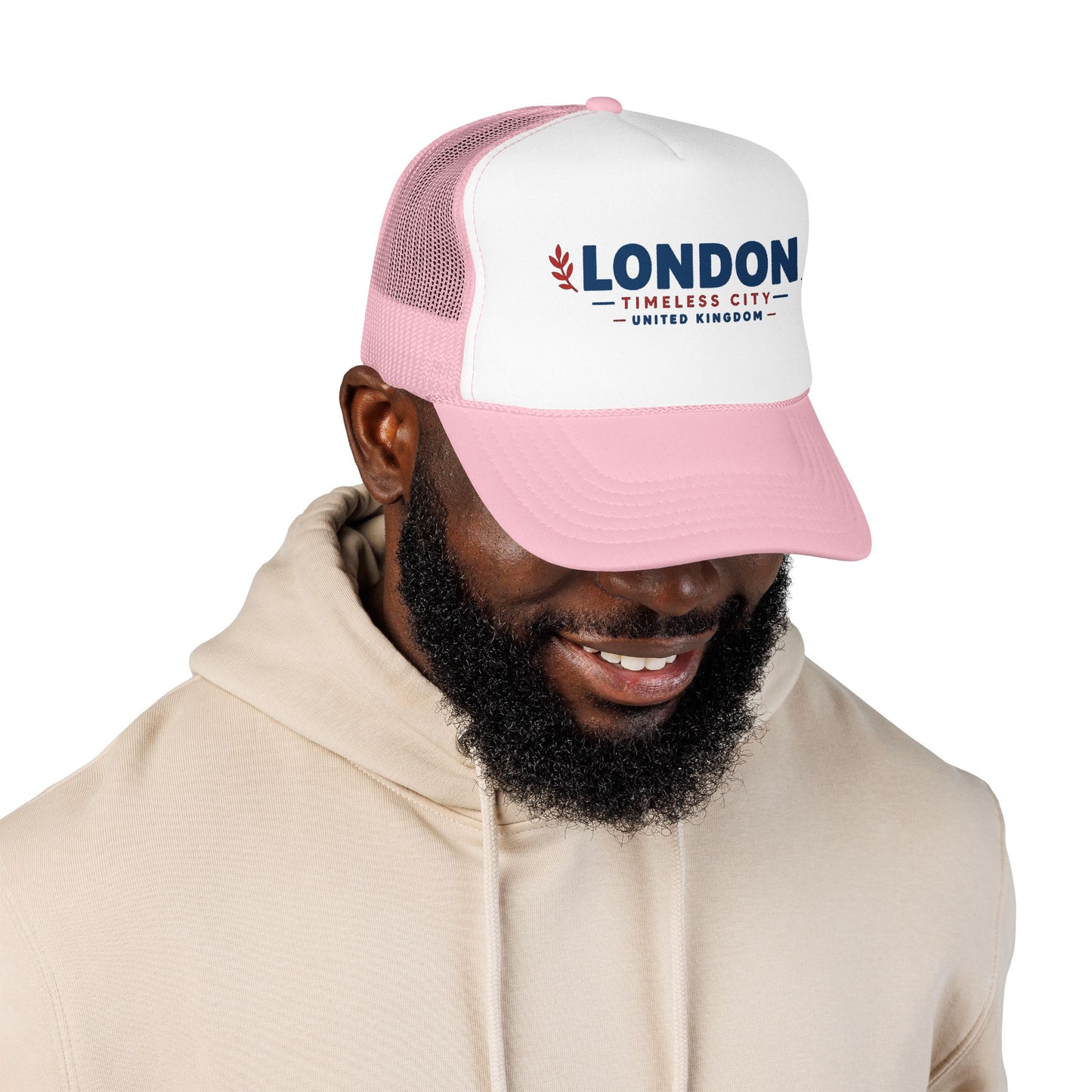 Light pink-and-white trucker hat with white front panel, pink mesh sides, LONDON logo