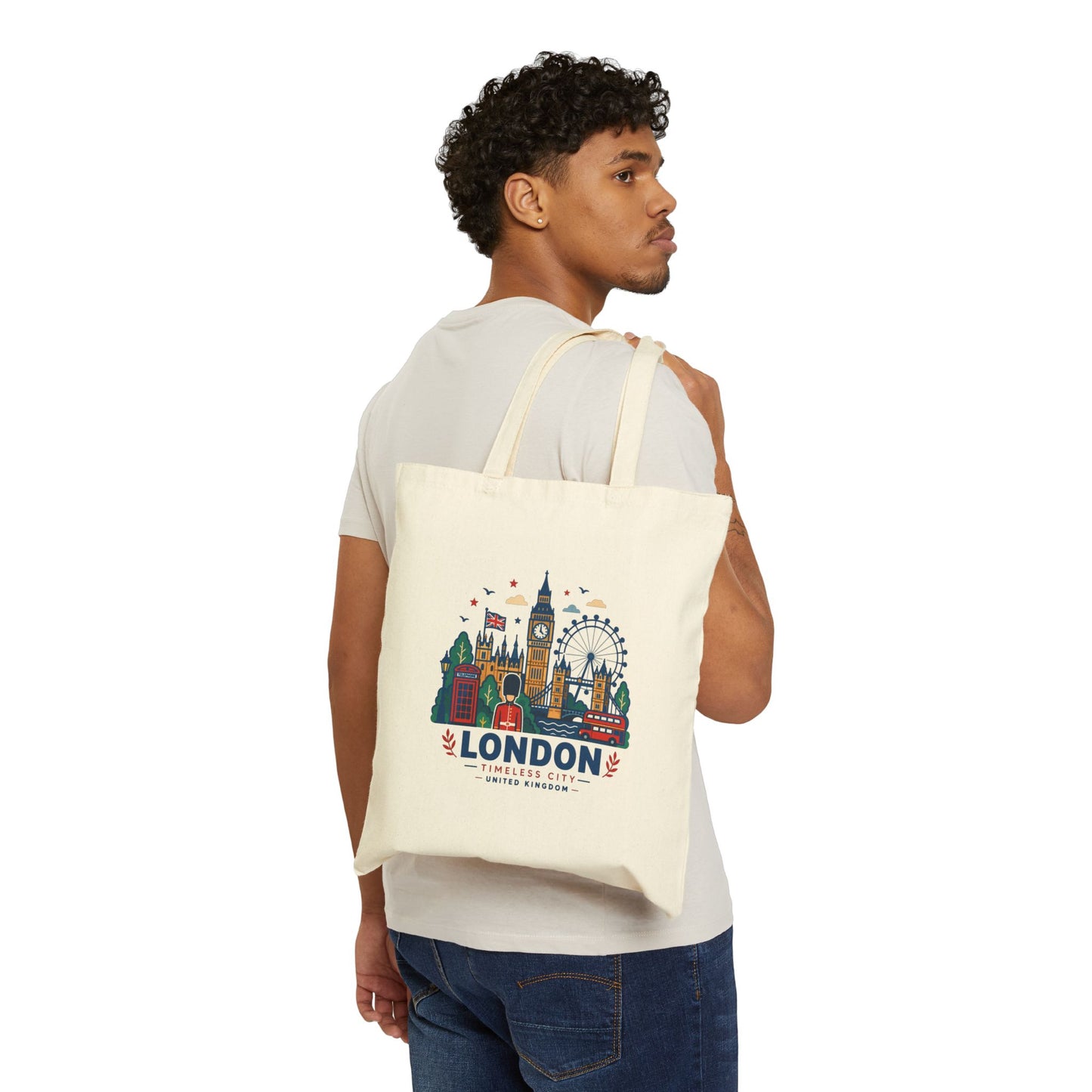 Natural canvas tote bag worn on the shoulder, London skyline graphic on front