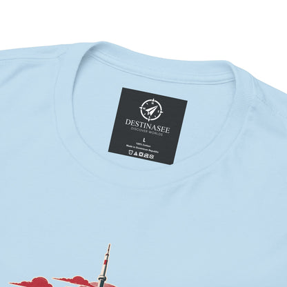 Light blue T-shirt back neckline with black brand label and partial skyline artwork