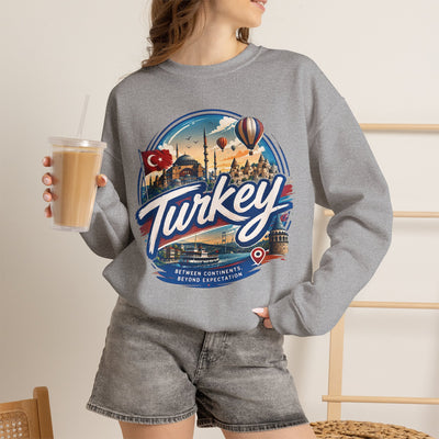 Heather gray crewneck sweatshirt with Turkey graphic, worn on model