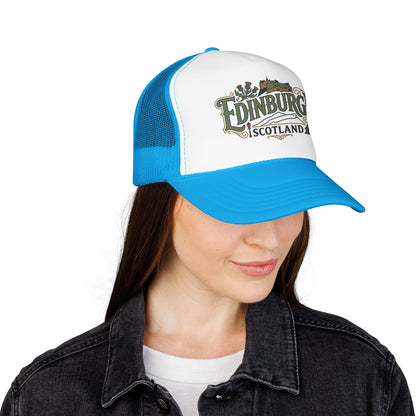 White front panel and blue mesh trucker hat with “Edinburgh Scotland” logo and curved brim.