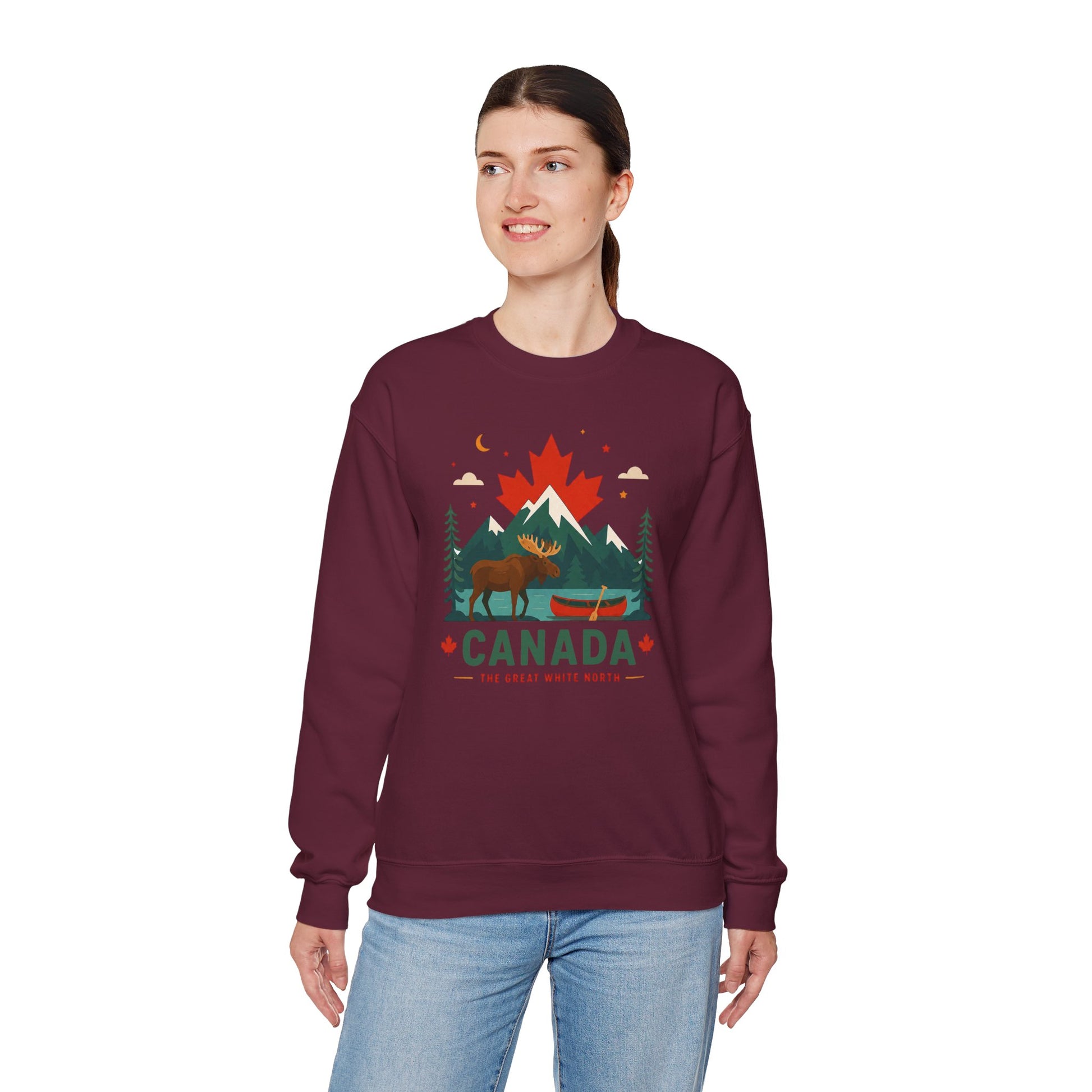 Maroon Canada moose and canoe sweatshirt with colorful mountain graphic and "Canada" text
