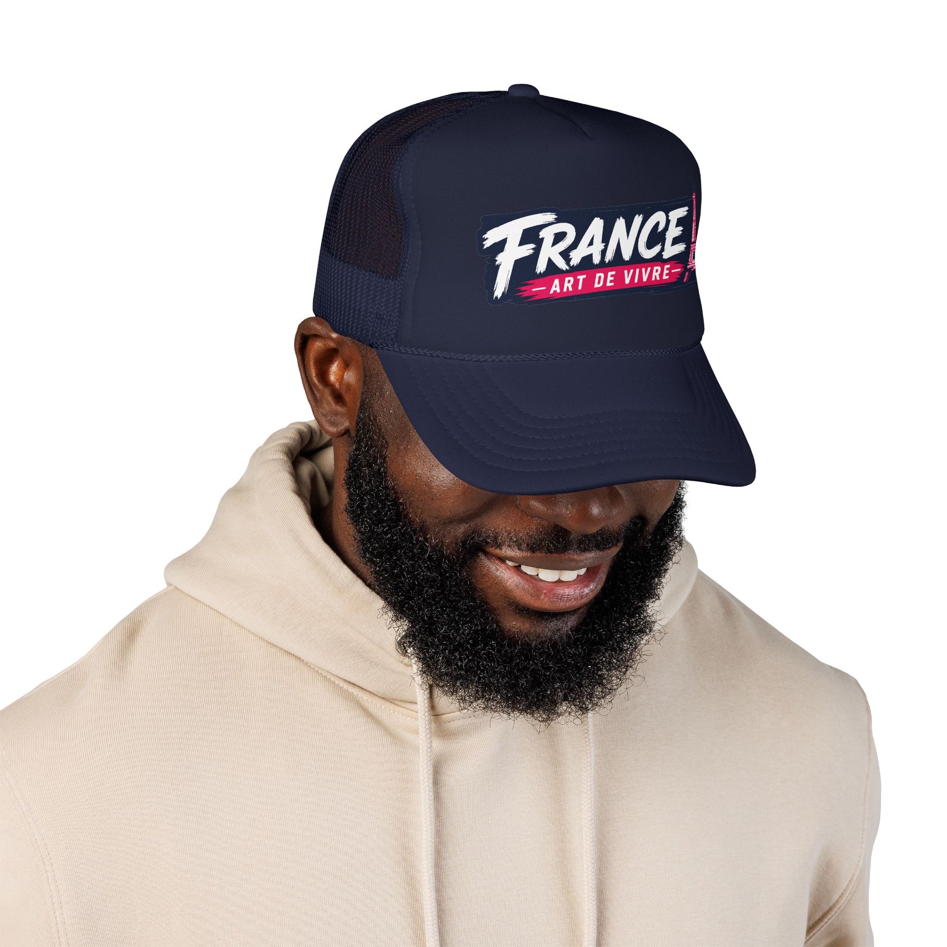 Dark navy trucker hat with mesh back, curved brim, white 'FRANCE' text logo