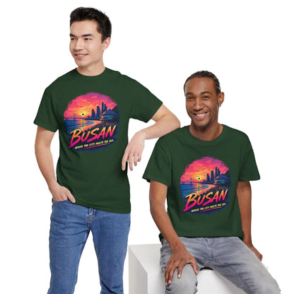 Dark green crew-neck T-shirt with Busan sunset city graphic, styled with jeans.
