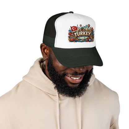 Black and white trucker hat with dark green brim on smiling man