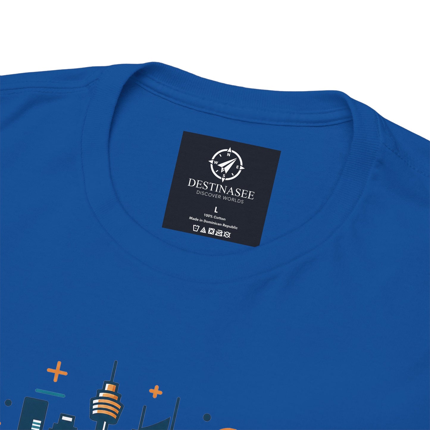 Royal blue crew-neck T-shirt with square DESTINASEE label near the collar