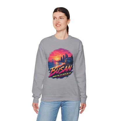 Heather gray crewneck sweatshirt, front graphic of Busan sunset over sea and skyline