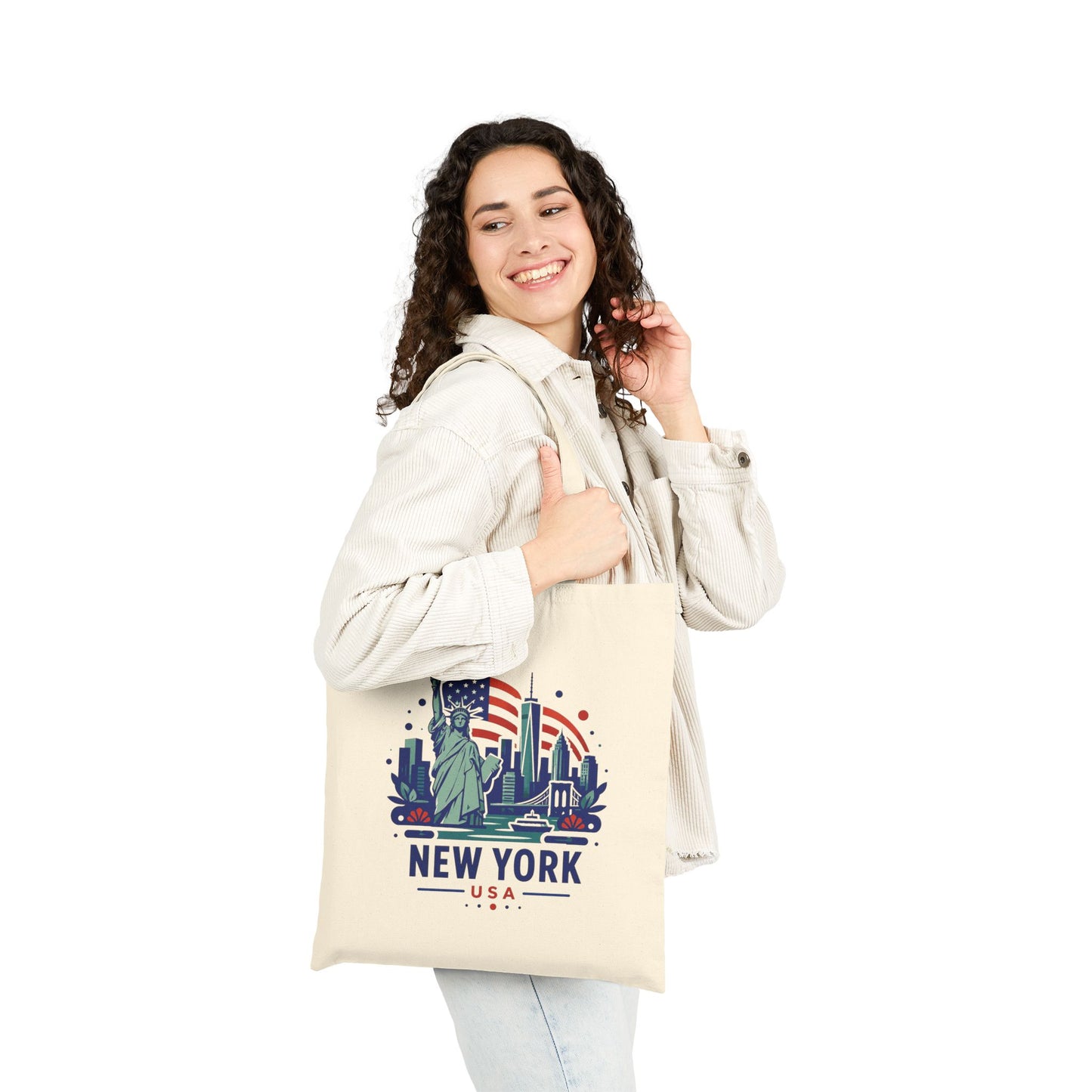 Natural cotton canvas tote bag worn by person, featuring Statue of Liberty New York graphic