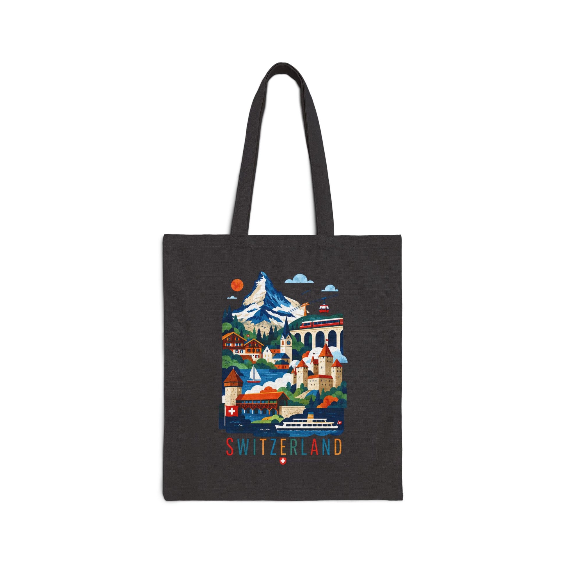 Black canvas tote bag with colorful Switzerland scenic print and red “SWITZERLAND” text.
