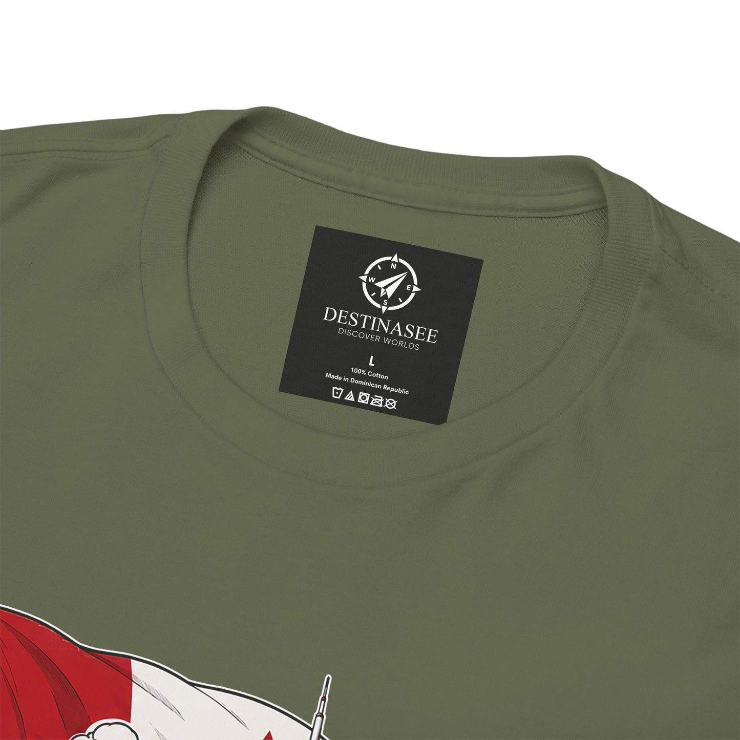 Olive green T-shirt close-up of neck label with partial Canada graphic artwork
