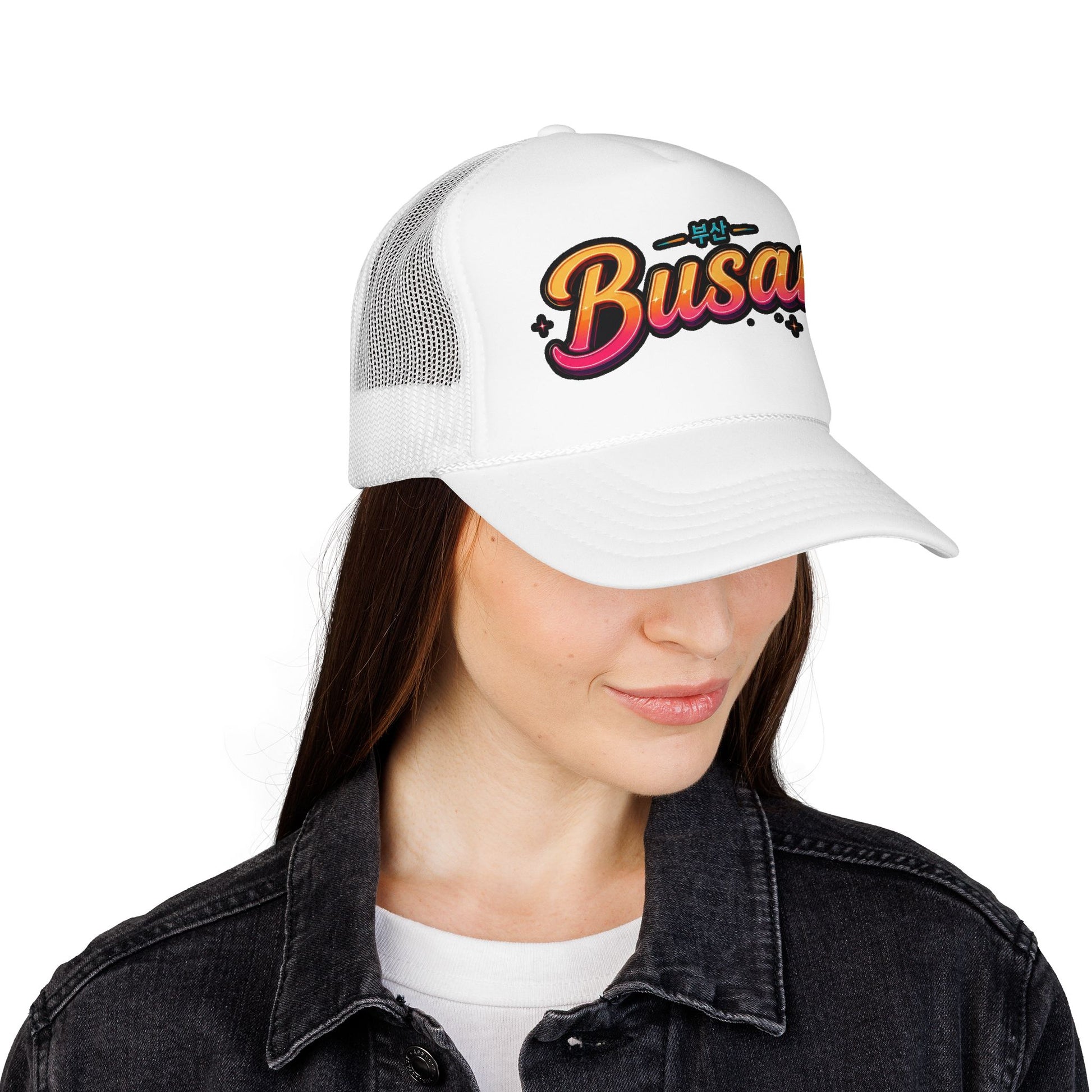 White mesh trucker hat with “Busan” logo on front and curved brim