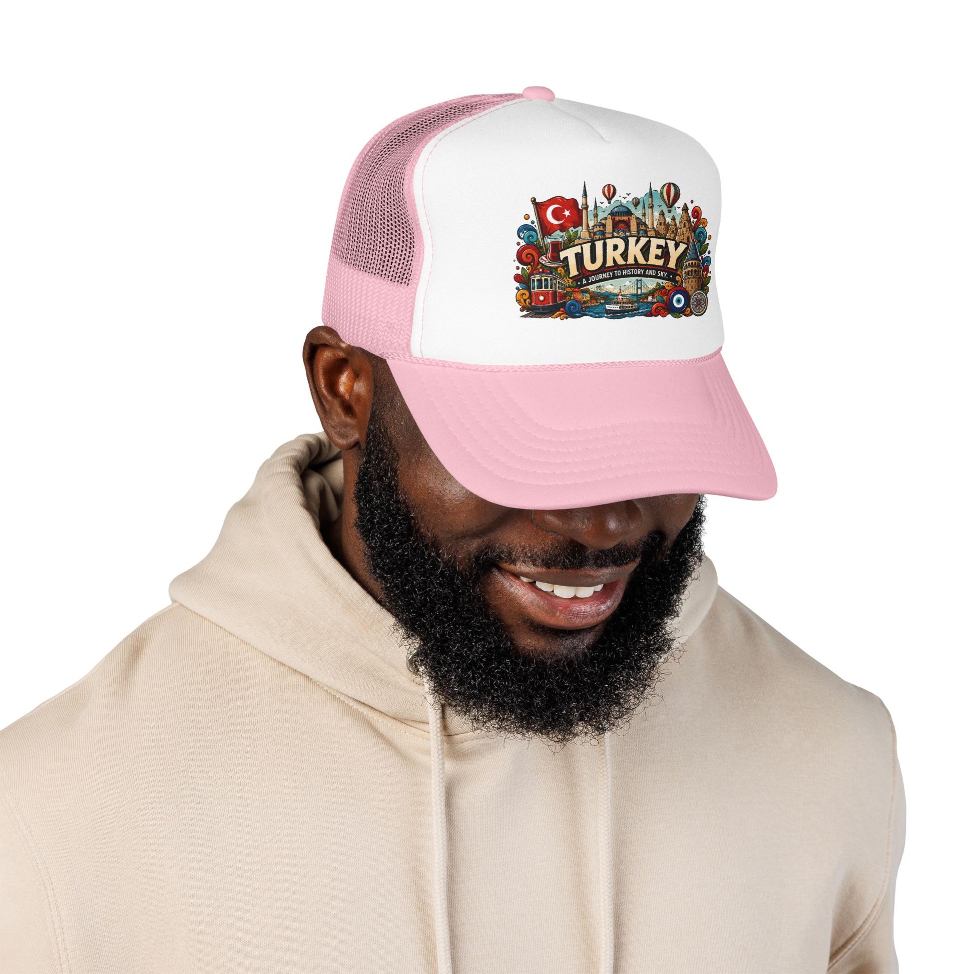Light pink and white trucker hat with pale pink brim on smiling man