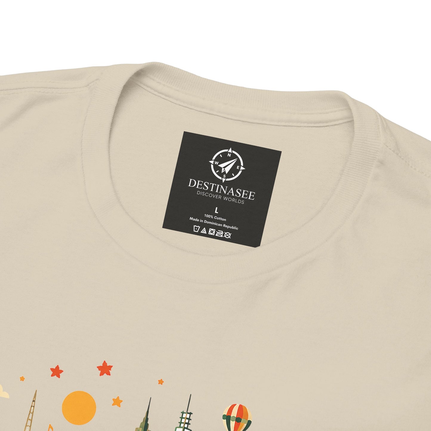 Natural beige T-shirt with black neck label patch and partial Melbourne skyline artwork