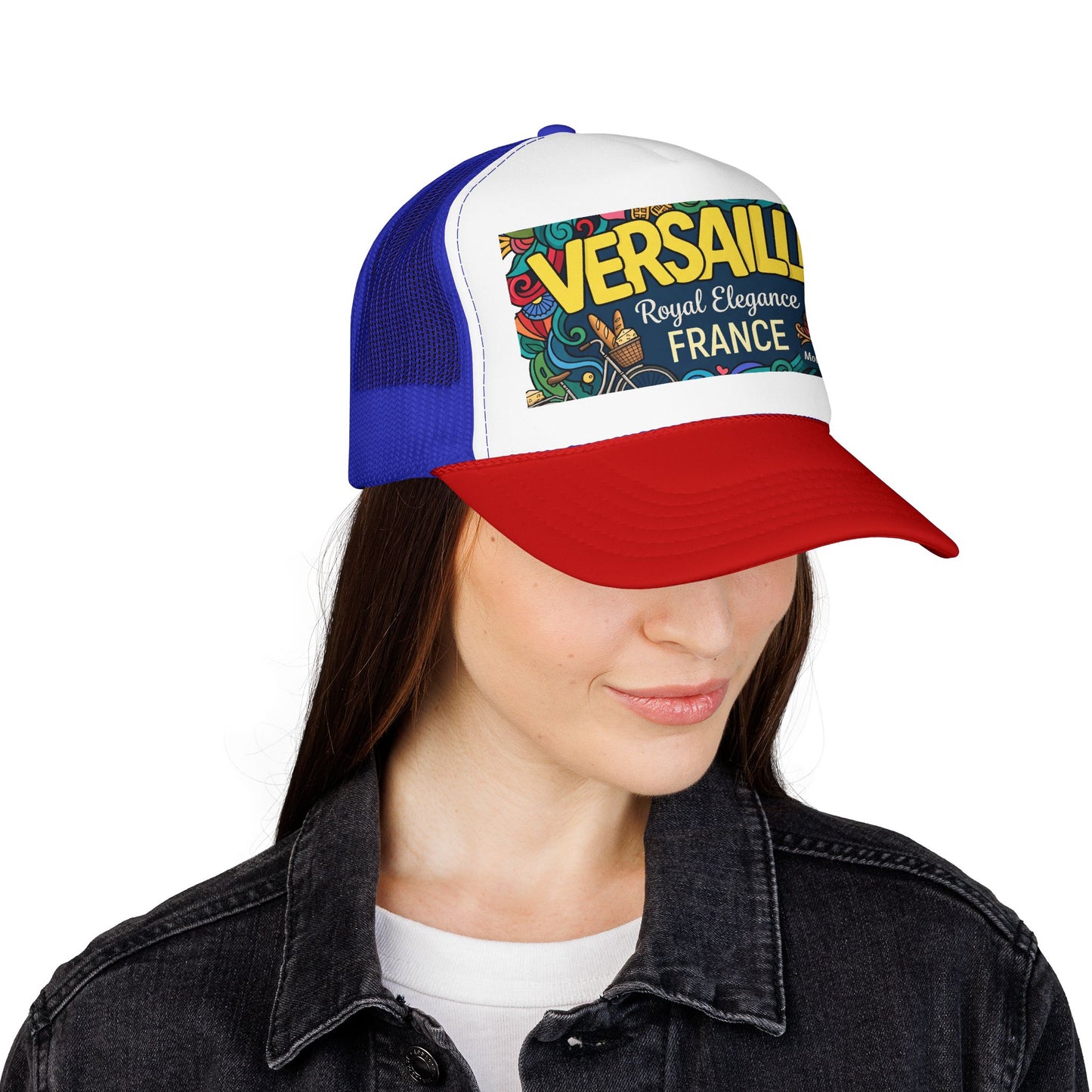 Two-tone blue and red trucker hat with mesh back and colorful Versailles France patch