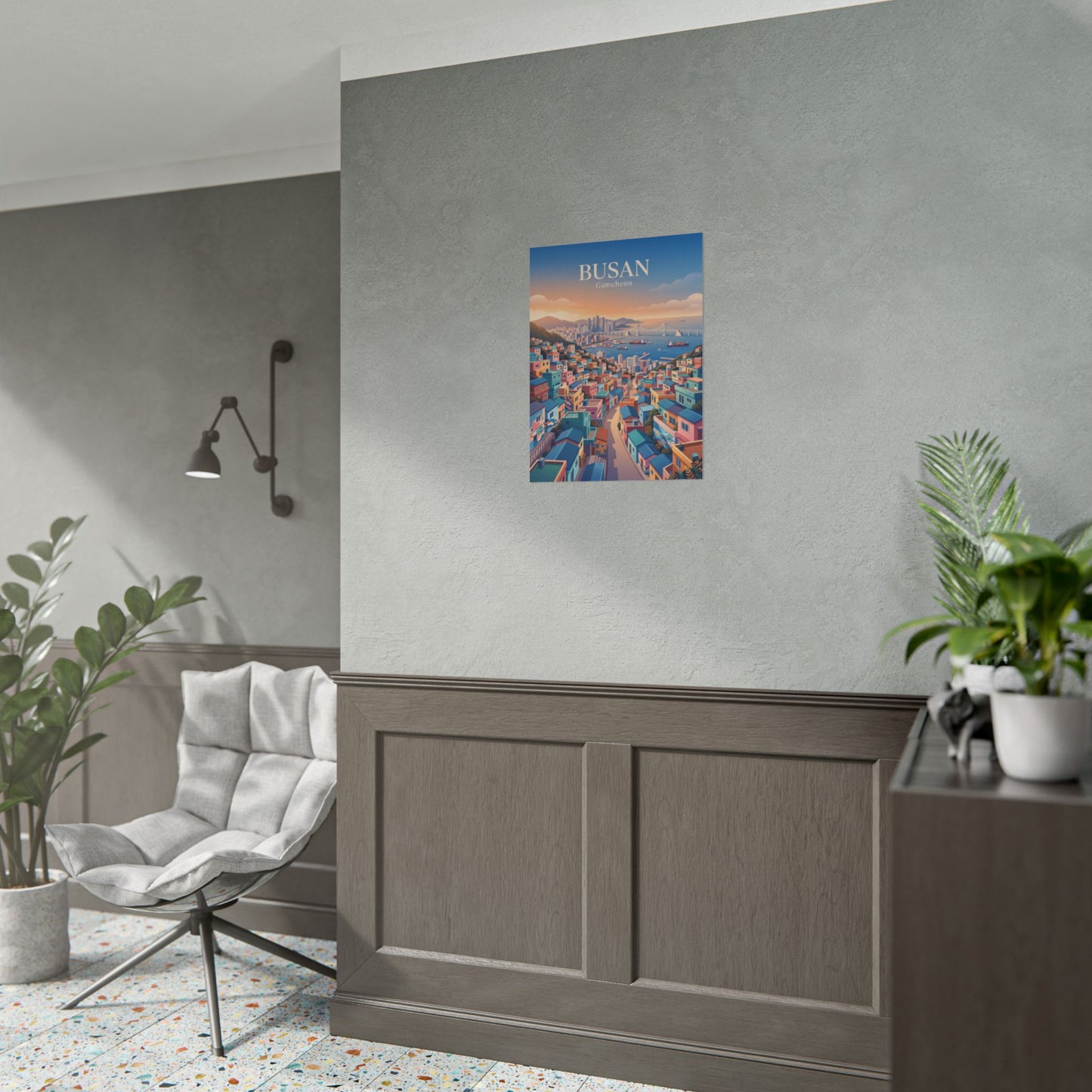 Rolled travel poster with Busan Gamecheon skyline illustration, mounted on wall