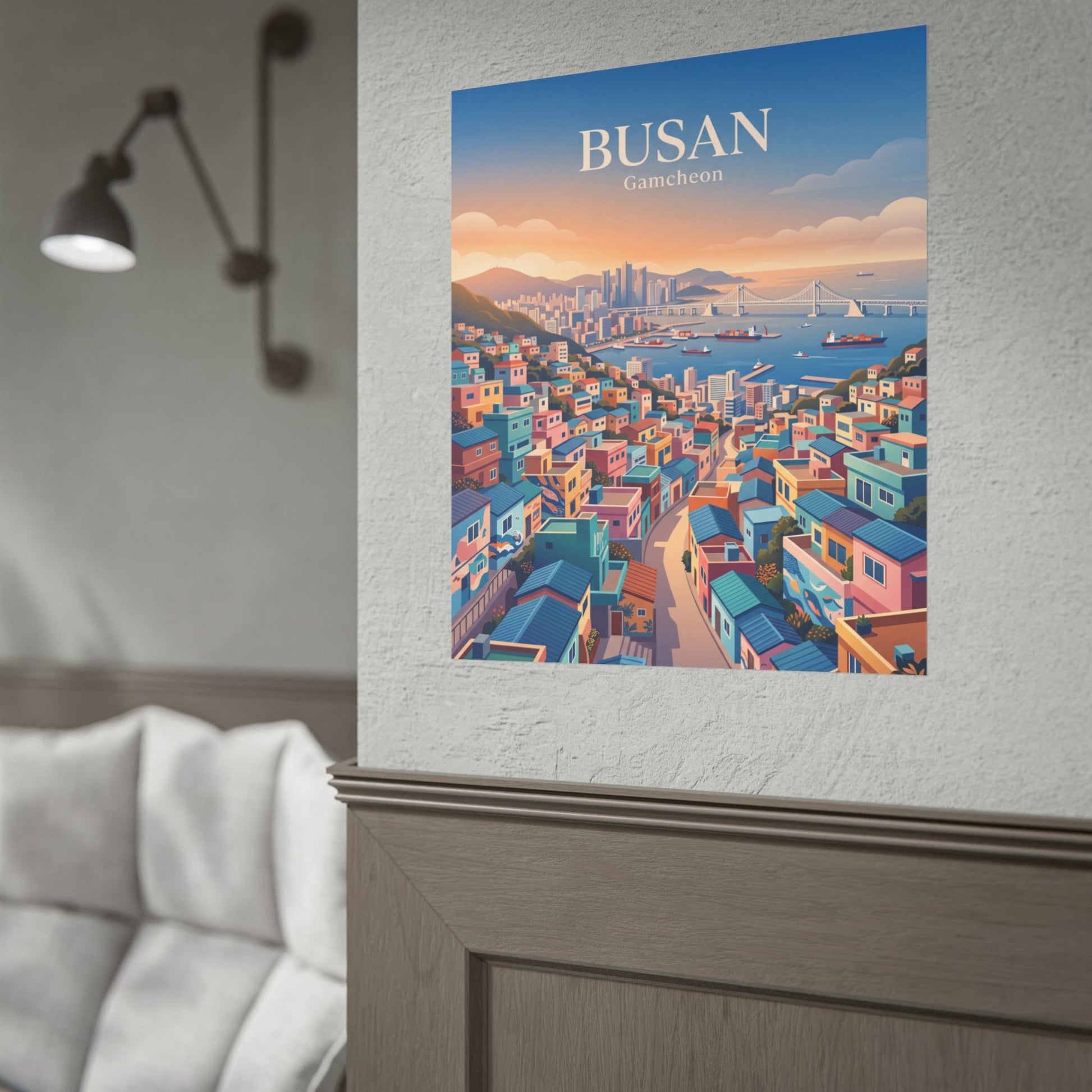 Rolled travel poster featuring Busan Gamecheon cityscape, mounted on a wall