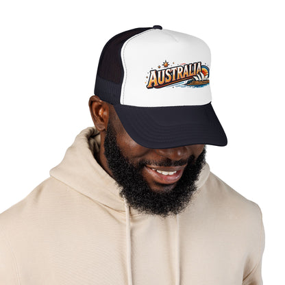 Black and white trucker cap with mesh panels and embroidered AUSTRALIA logo, curved brim.