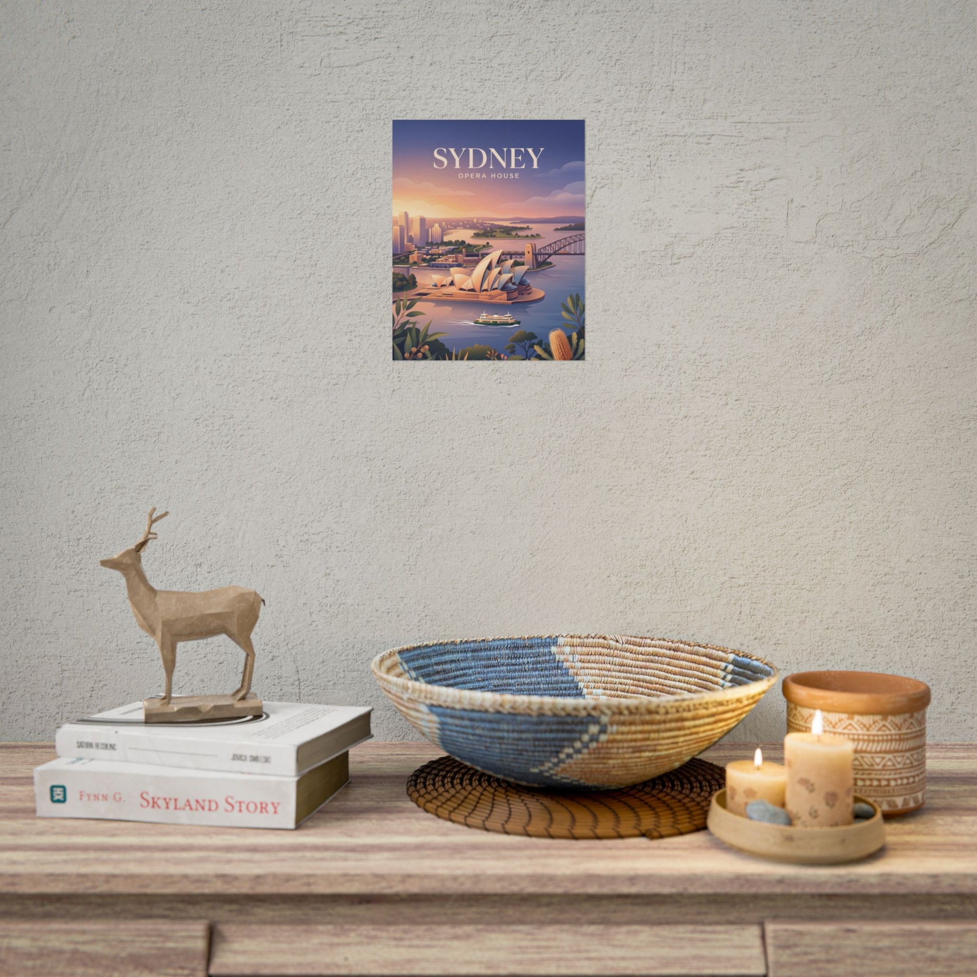 Sydney Opera House rolled poster centered on wall, small sunset harbor artwork with SYDNEY