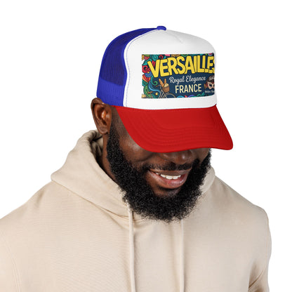 Two-tone blue and red trucker hat with mesh back, colorful Versailles France patch