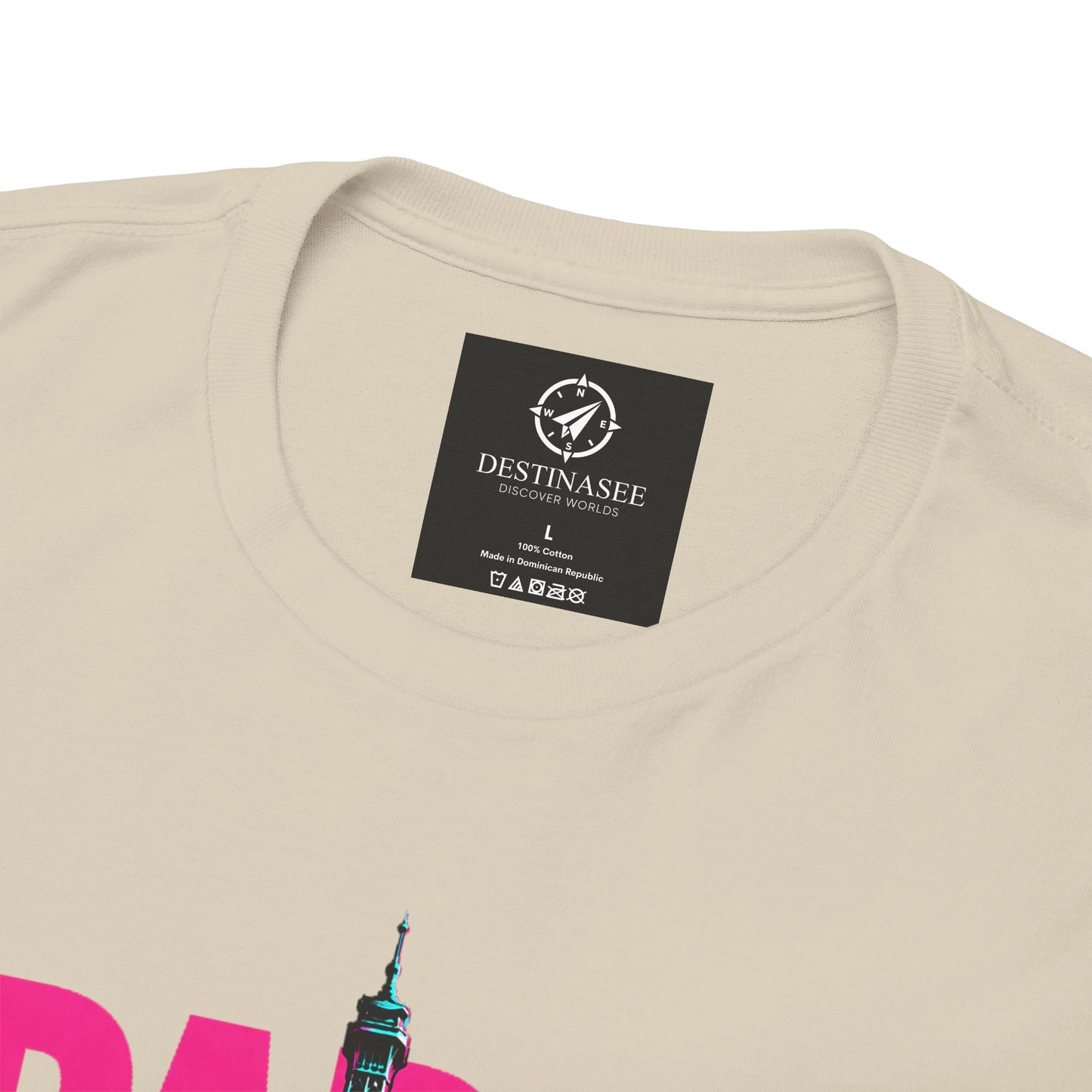 Beige T-shirt close-up: neck label and partial Eiffel Tower graphic