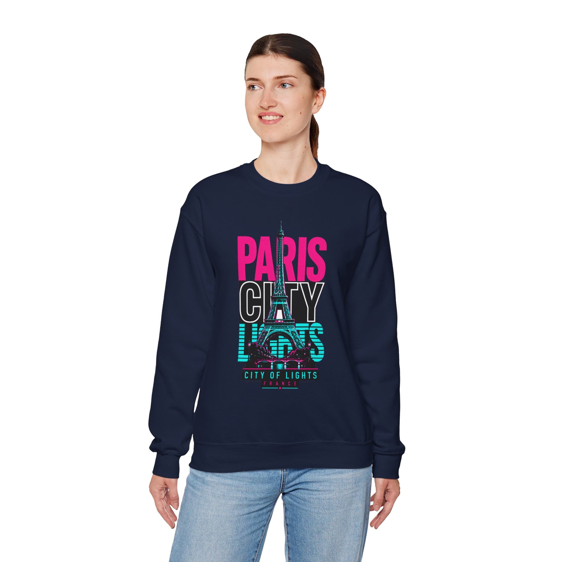 Navy crewneck sweatshirt worn by model, featuring PARIS CITY Eiffel Tower lights graphic.