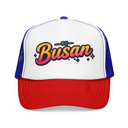 White and blue trucker hat with “Busan” front logo and mesh side panels