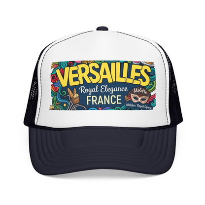 White and black trucker hat with mesh back and “Versailles France” front patch
