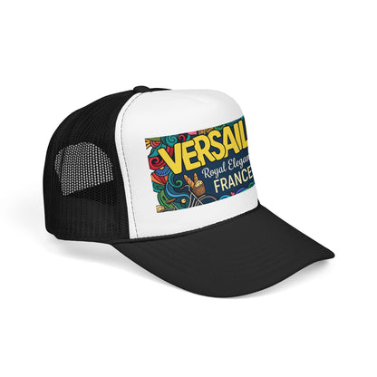 Black and white trucker hat with mesh sides and colorful “Versailles” front patch