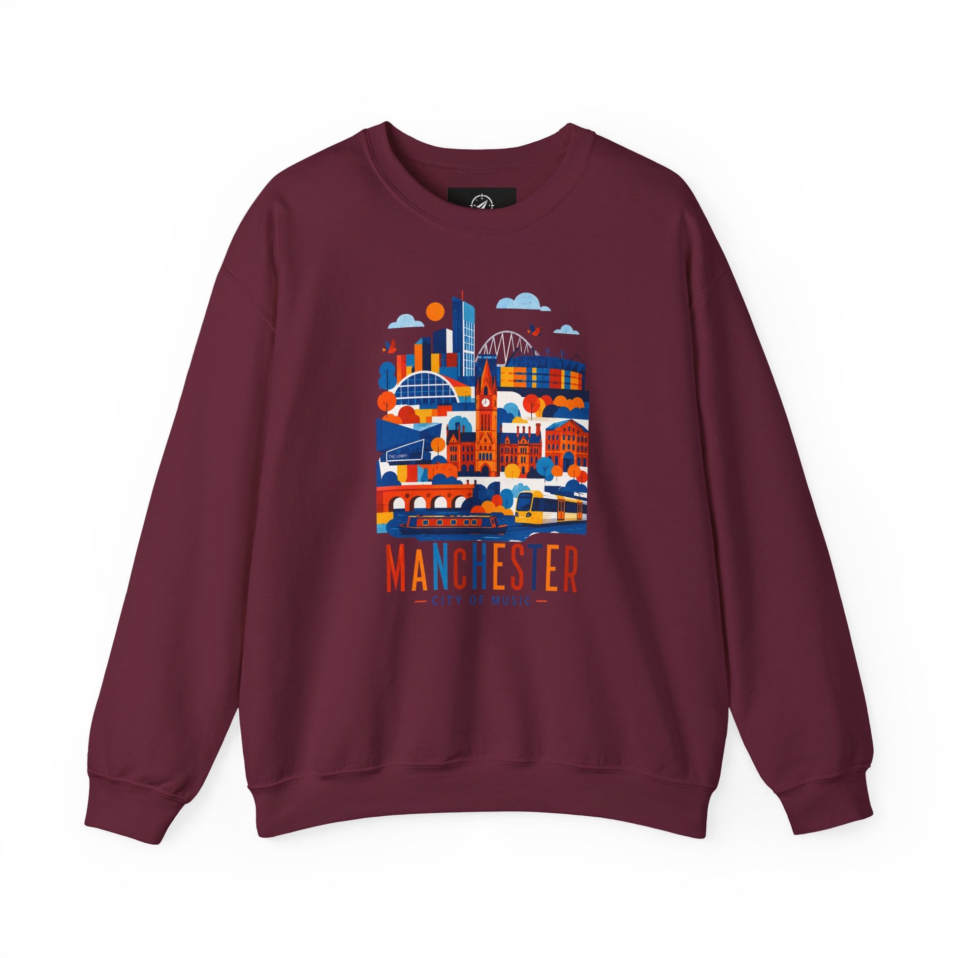 Maroon crewneck sweatshirt with colorful Manchester cityscape graphic on chest