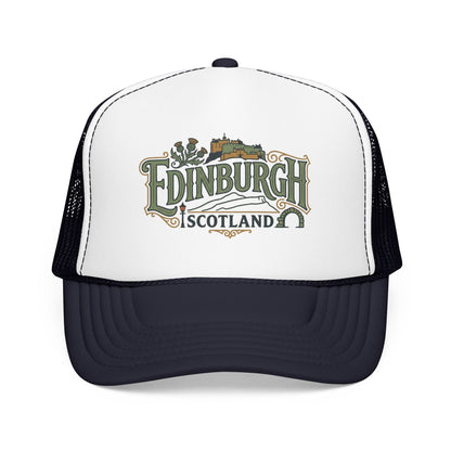 White and navy trucker hat with mesh back and Edinburgh Scotland logo front.