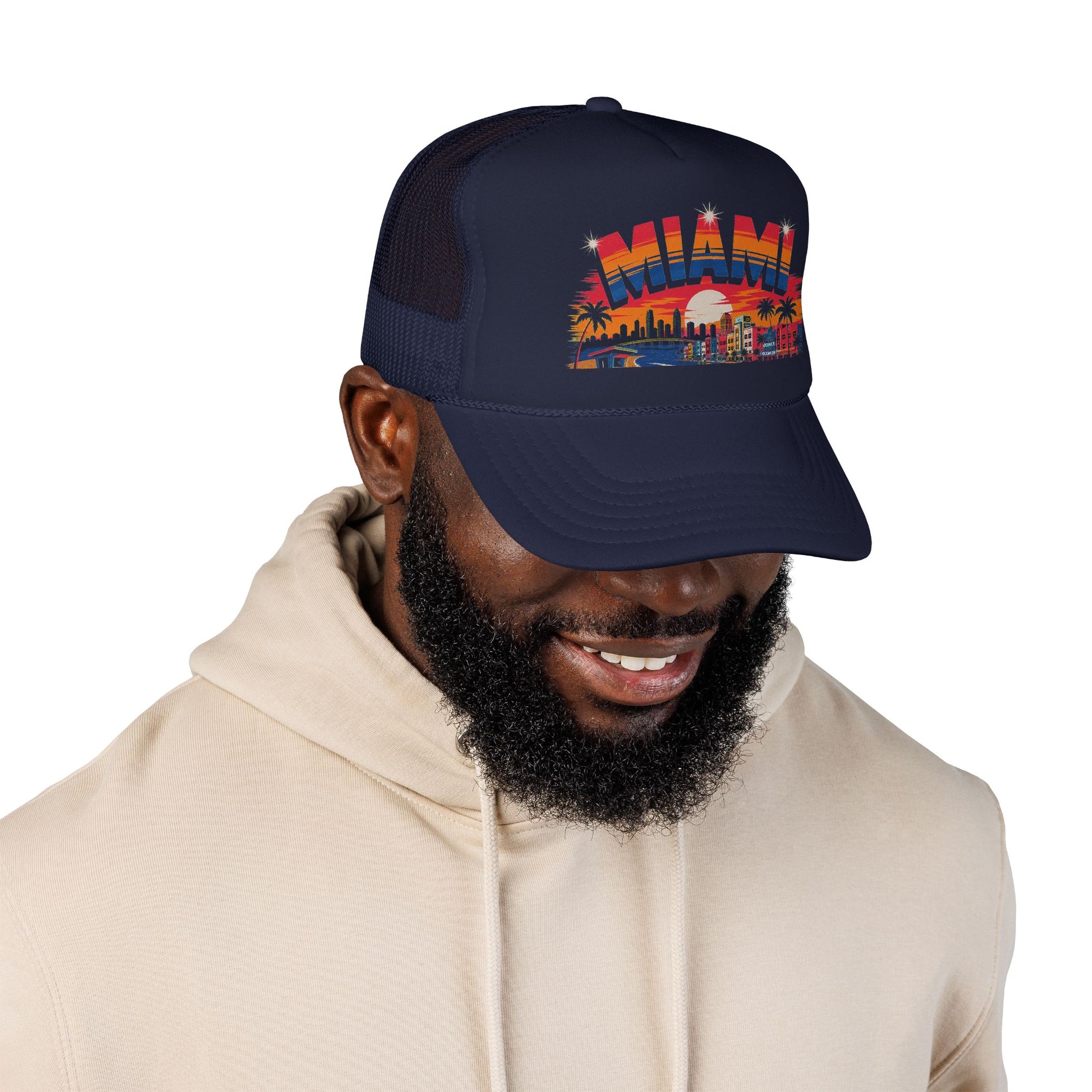 Dark navy trucker hat on model, Miami sunset skyline front graphic visible