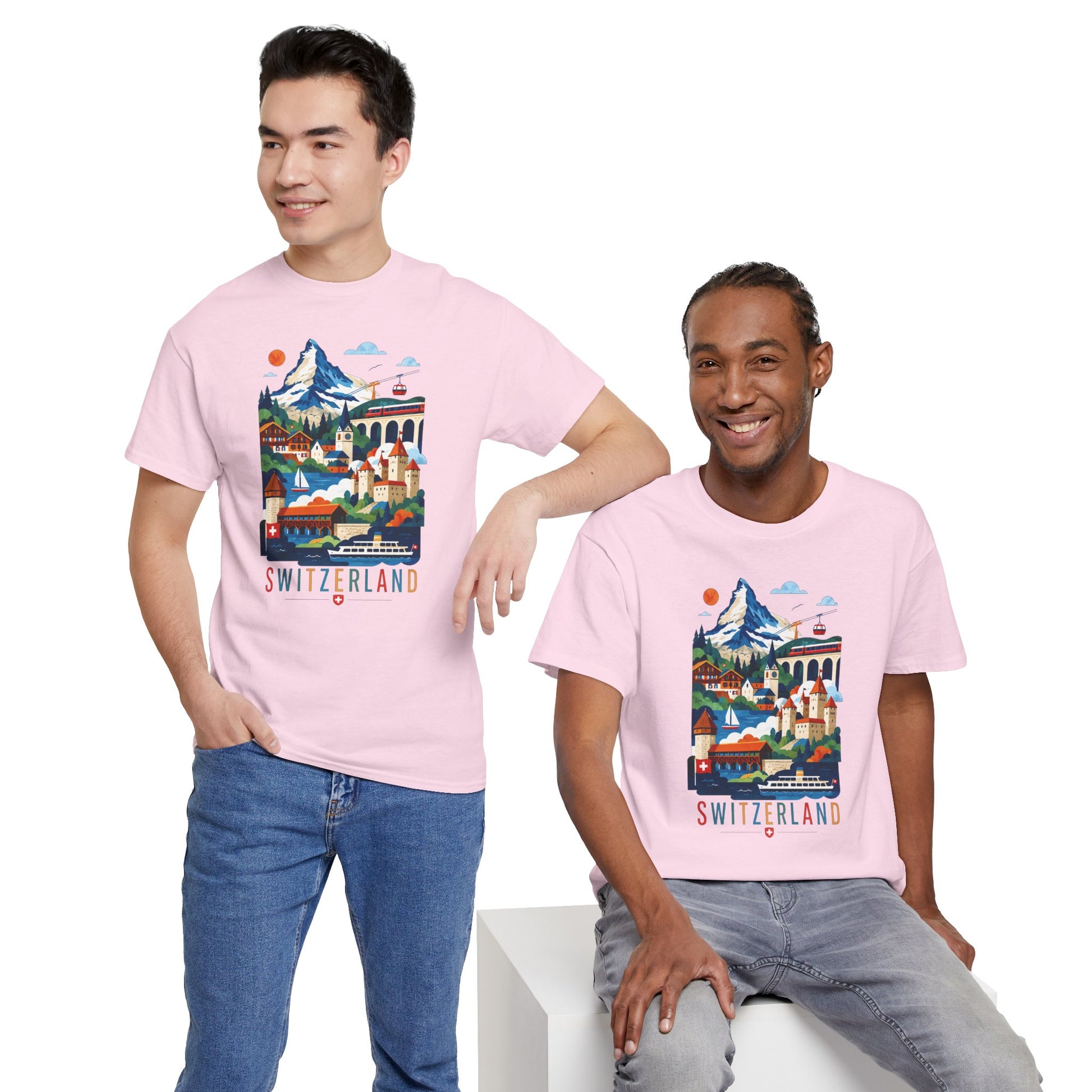 Light pink T-shirt with colorful Switzerland village graphic and “SWITZERLAND” text