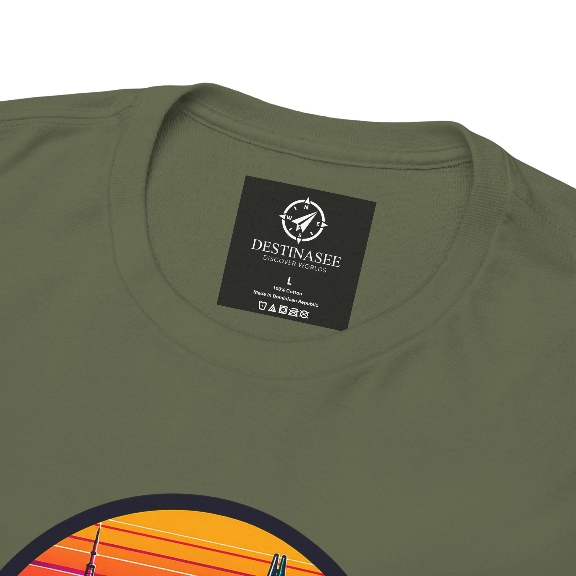 Olive green short-sleeve T-shirt close-up: small chest tag and top of city graphic