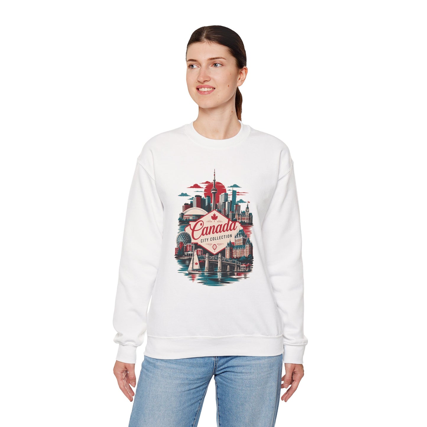 White crewneck sweatshirt with colorful Canada city skyline graphic on the chest.