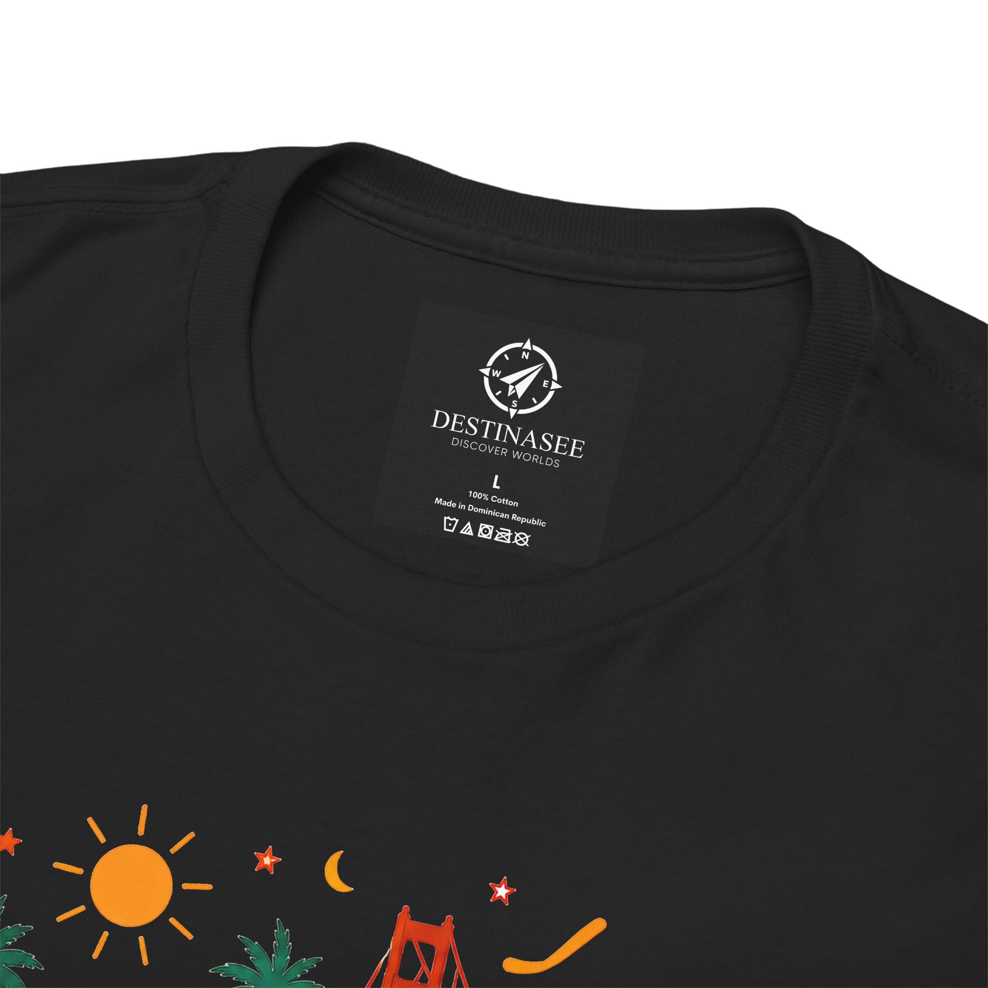 Black T-shirt neckline close-up with small interior brand label and partial graphic print